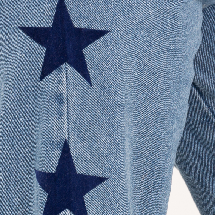 JEAN PARA NIÑAS CON ESTRELLAS LATERALES CON EFECTO FLOCK