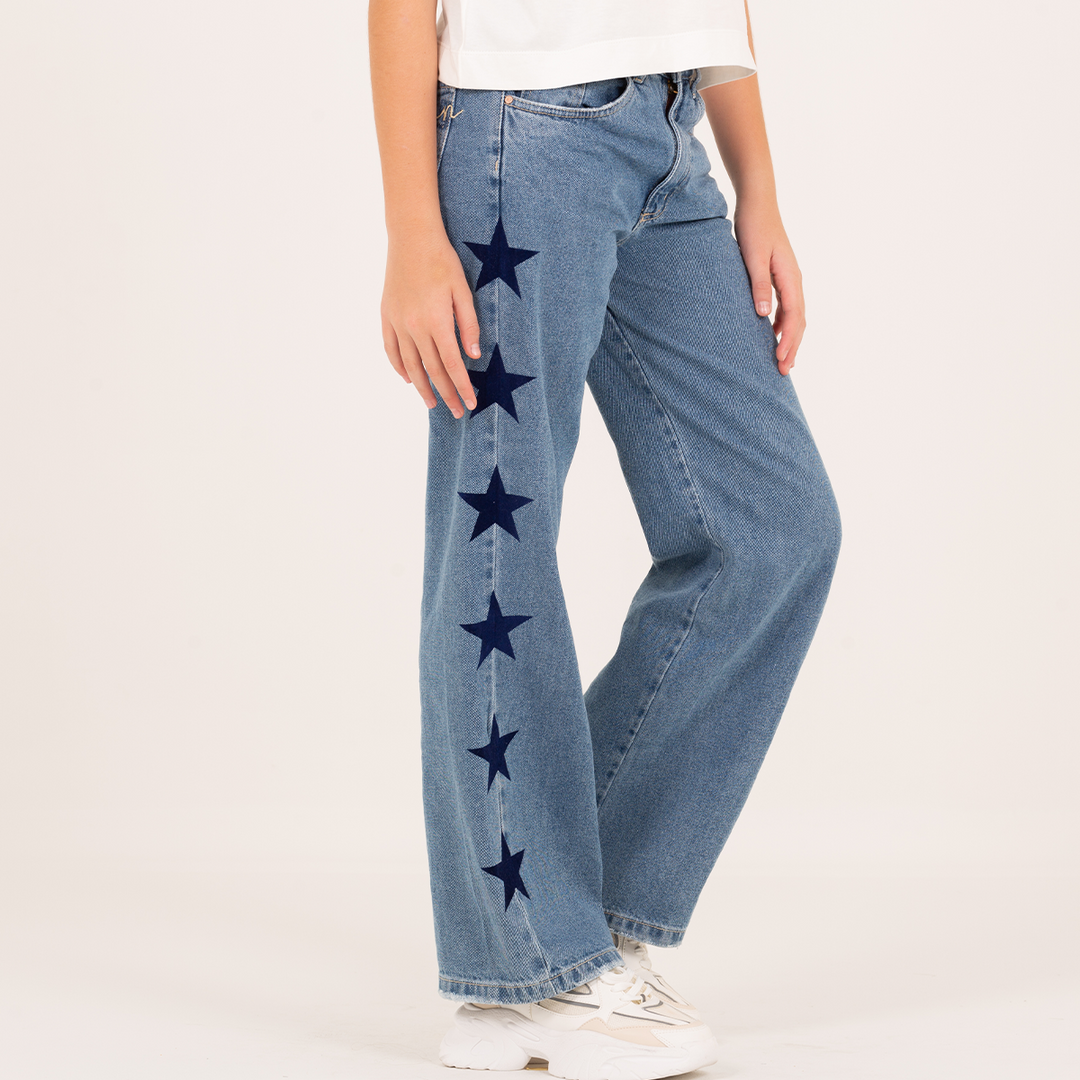 JEAN PARA NIÑAS CON ESTRELLAS LATERALES CON EFECTO FLOCK
