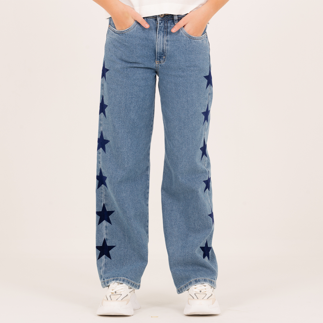 JEAN PARA NIÑAS CON ESTRELLAS LATERALES CON EFECTO FLOCK