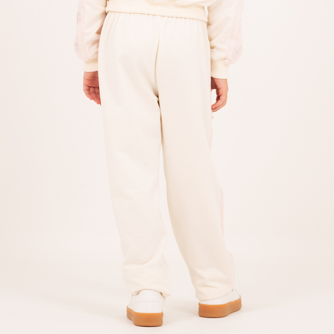 PANTALÓN PARA NIÑA CON DETALLES DE MOÑOS EN FOIL