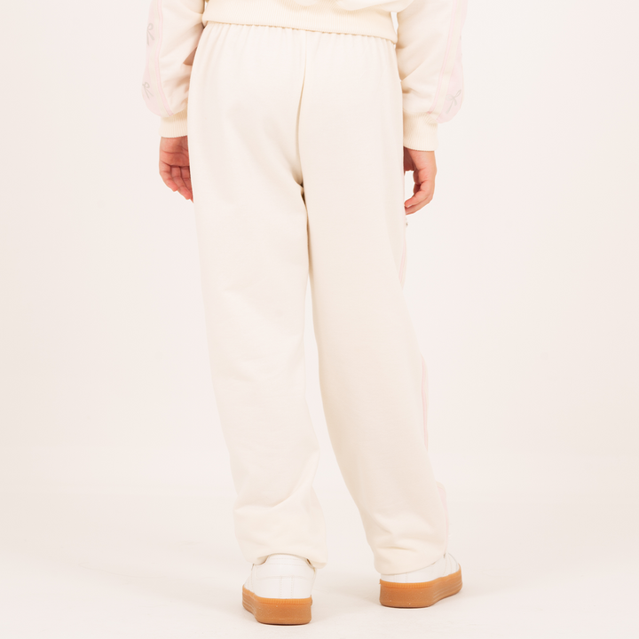 PANTALÓN PARA NIÑA CON DETALLES DE MOÑOS EN FOIL