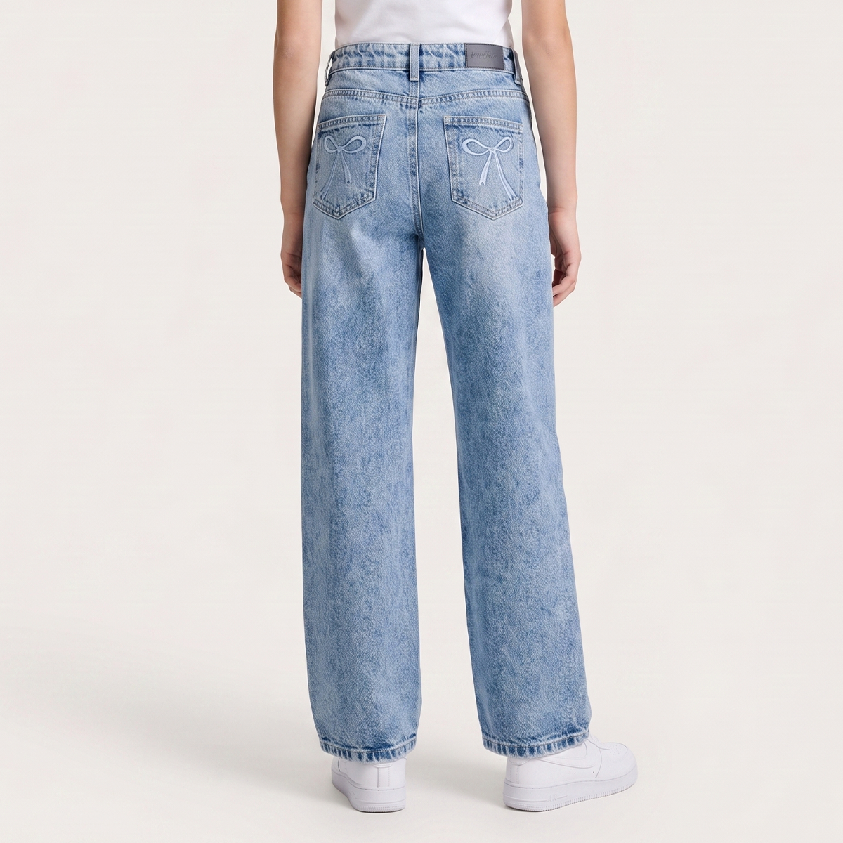 Jean para niñas con diseño de lazo bordado - Azul