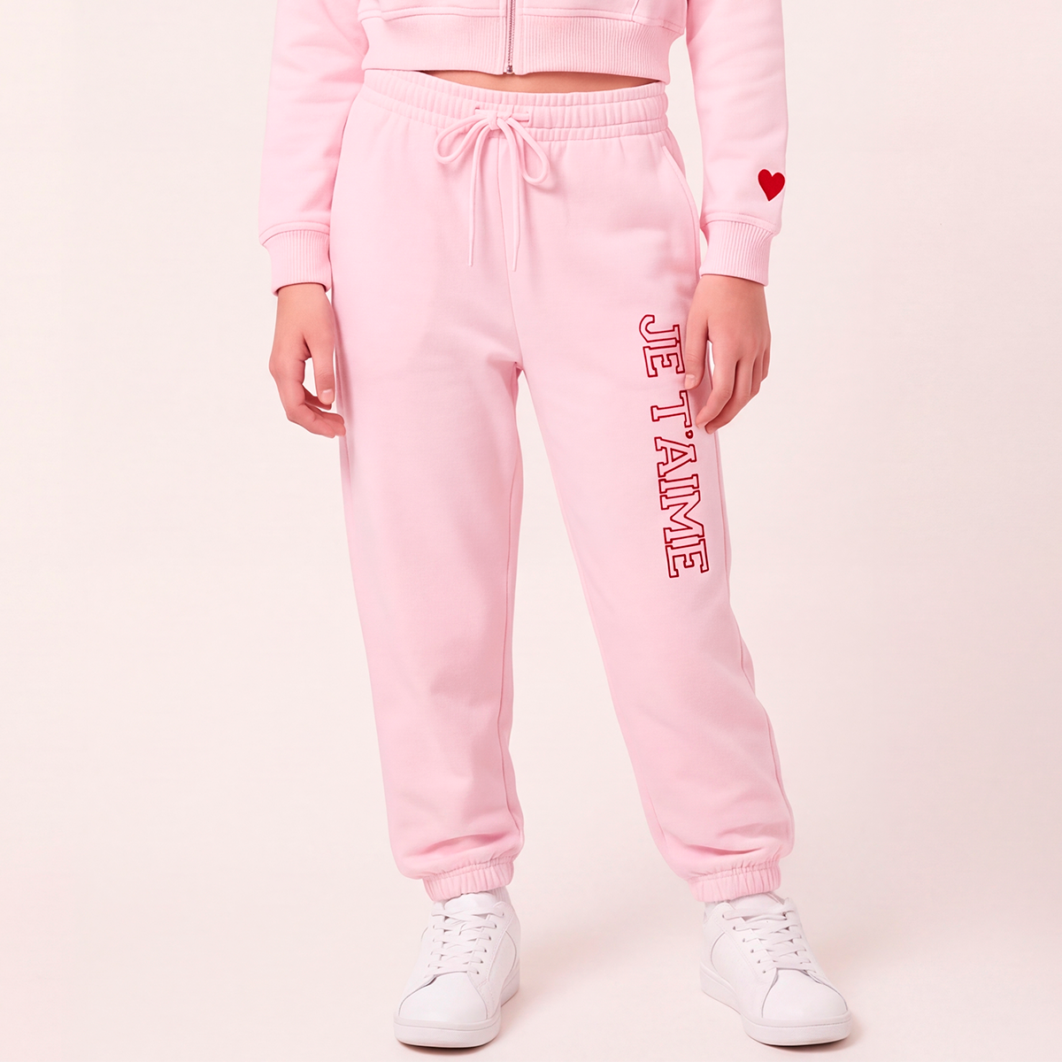Jogger para niñas con diseño bordado - Rosado