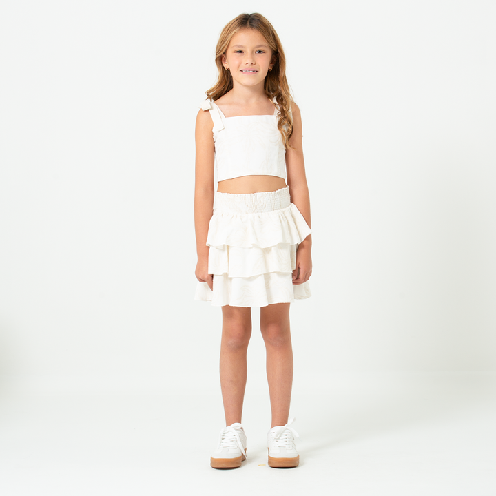 FALDA SHORT PARA NIÑAS CON BOLEROS EN CAPAS - COLOR BEIGE