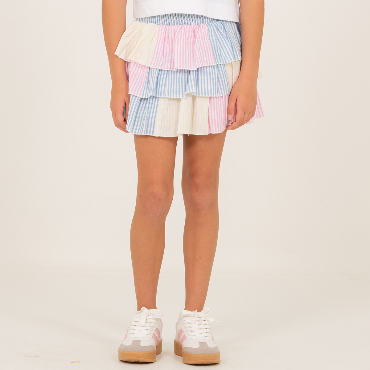 Falda short para niñas con boleros en capas