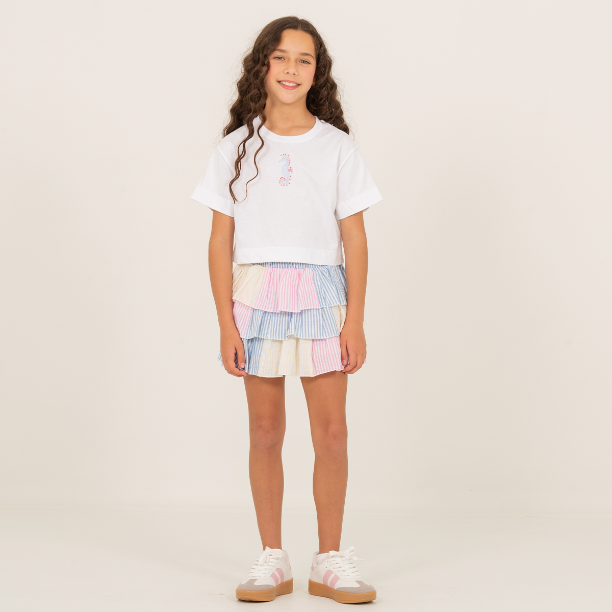 Falda short para niñas con boleros en capas