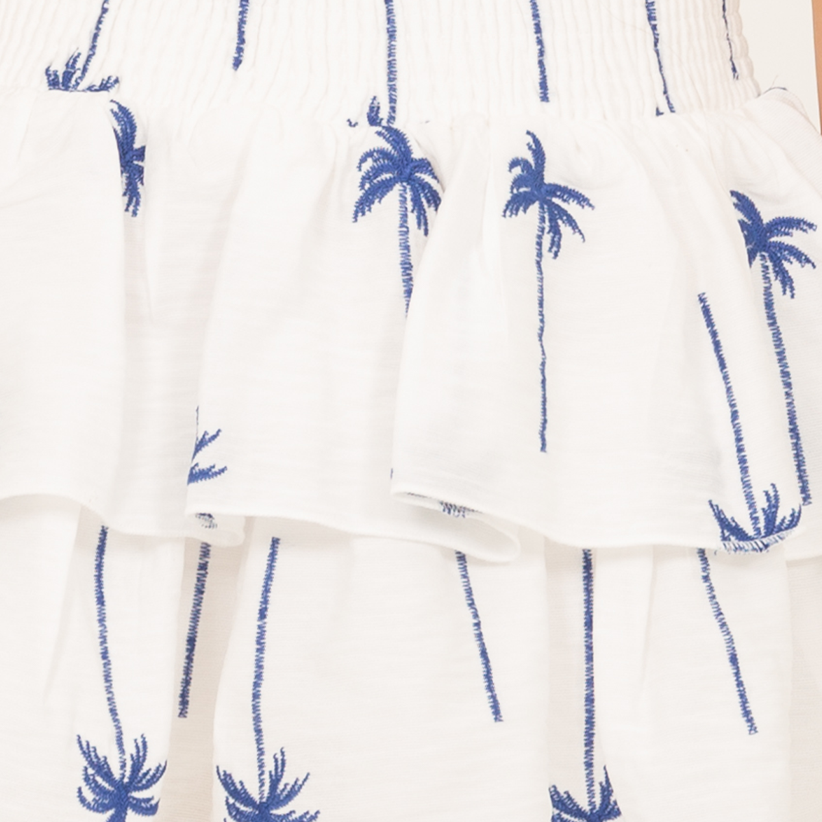 Falda short para niñas con diseño de palmeras bordadas