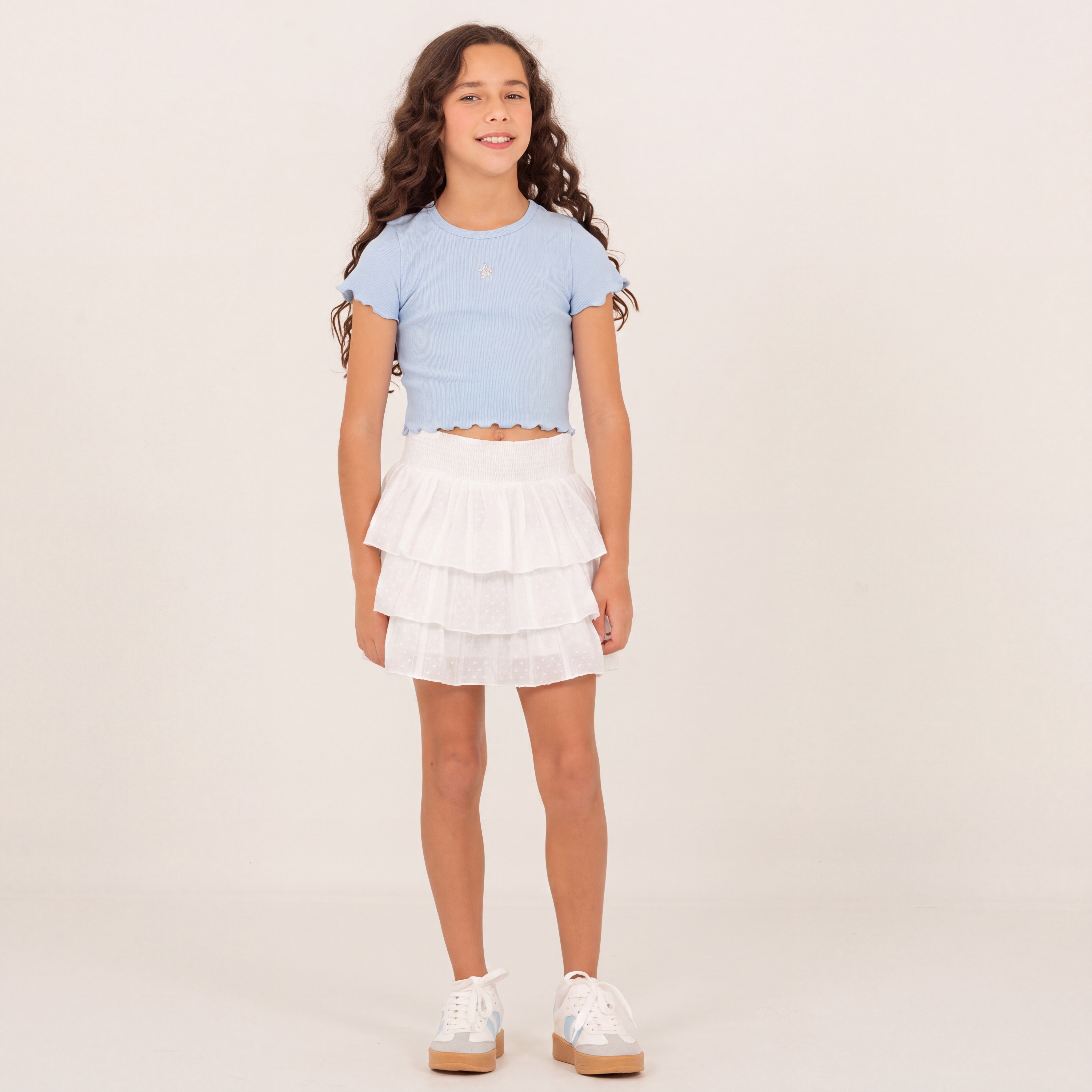 Falda short para niñas con boleros en capas