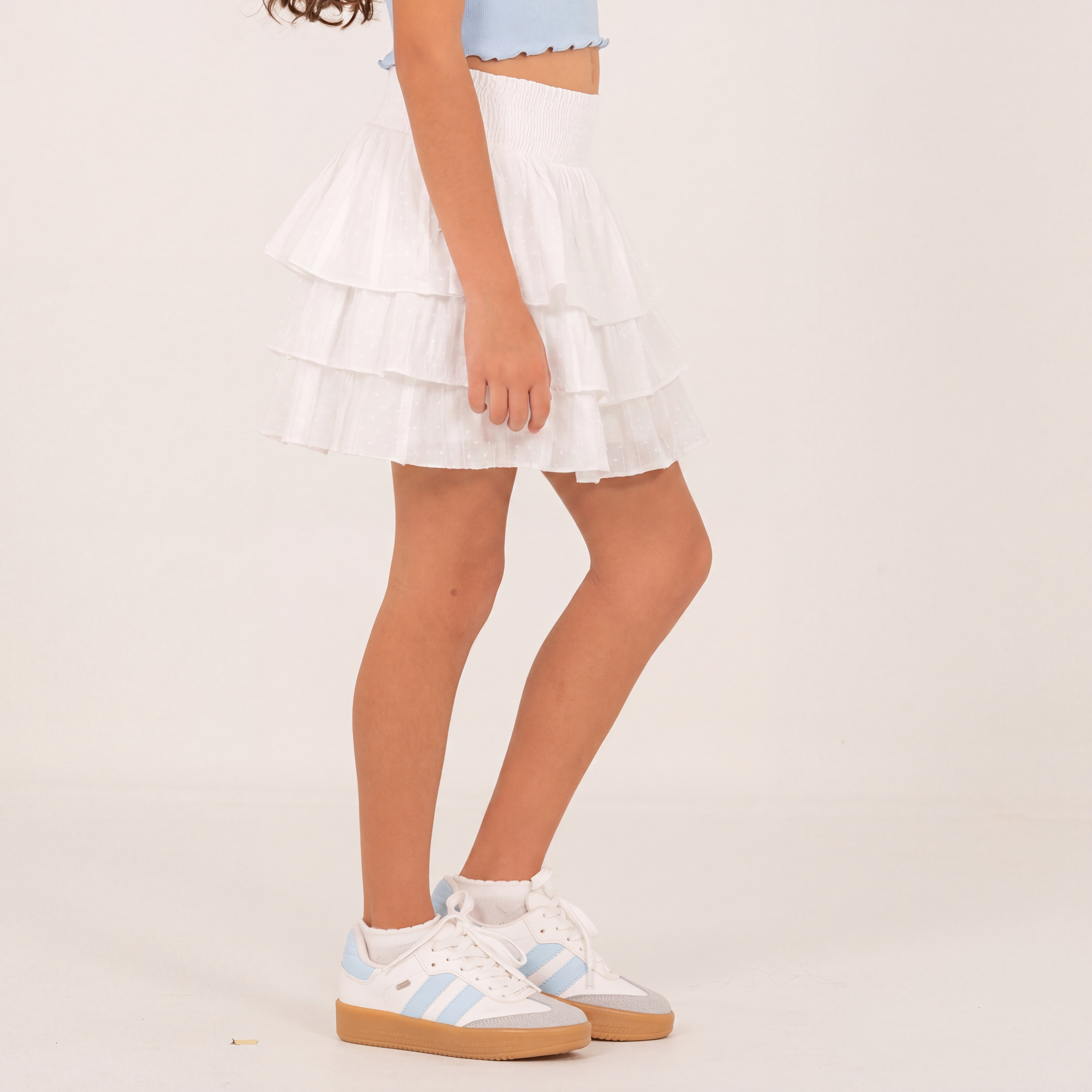 Falda short para niñas con boleros en capas