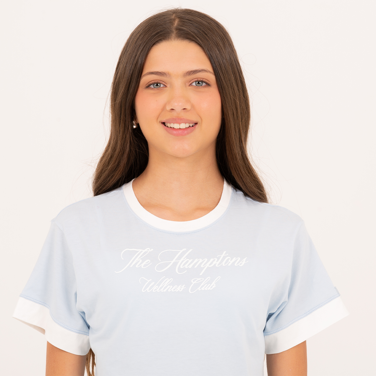 Camiseta crop para niñas con grafico estampado – Azul claro