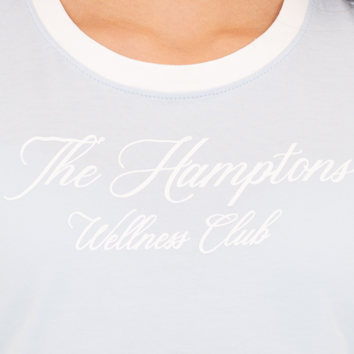 Camiseta crop para niñas con grafico estampado – Azul claro