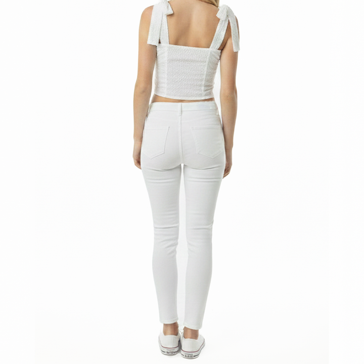 CROP TOP PARA NIÑAS CON DISEÑO EN OJALILLO COLOR BEIGE
