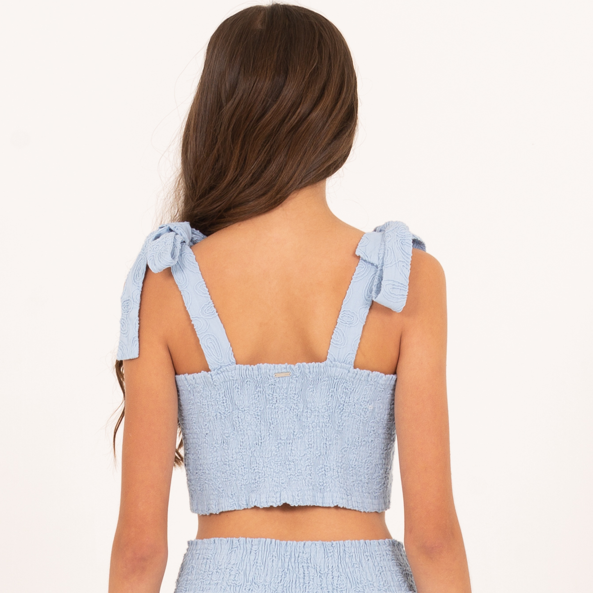 Crop top para niñas con diseño en ojalillo - Azul claro