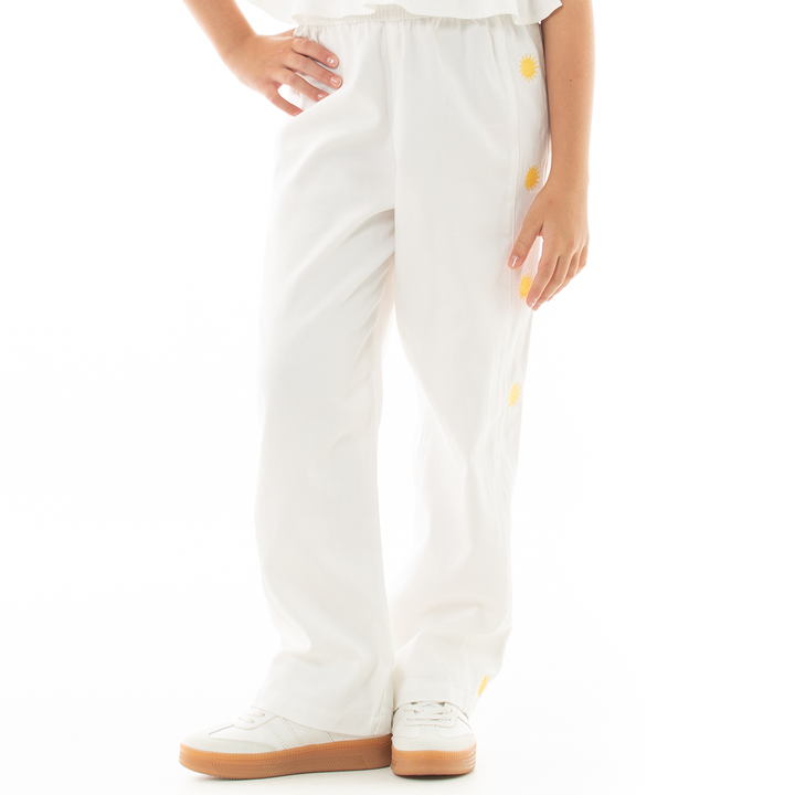 PANTALON PARA NIÑAS CON DISEÑO BORDADO DE SOLES