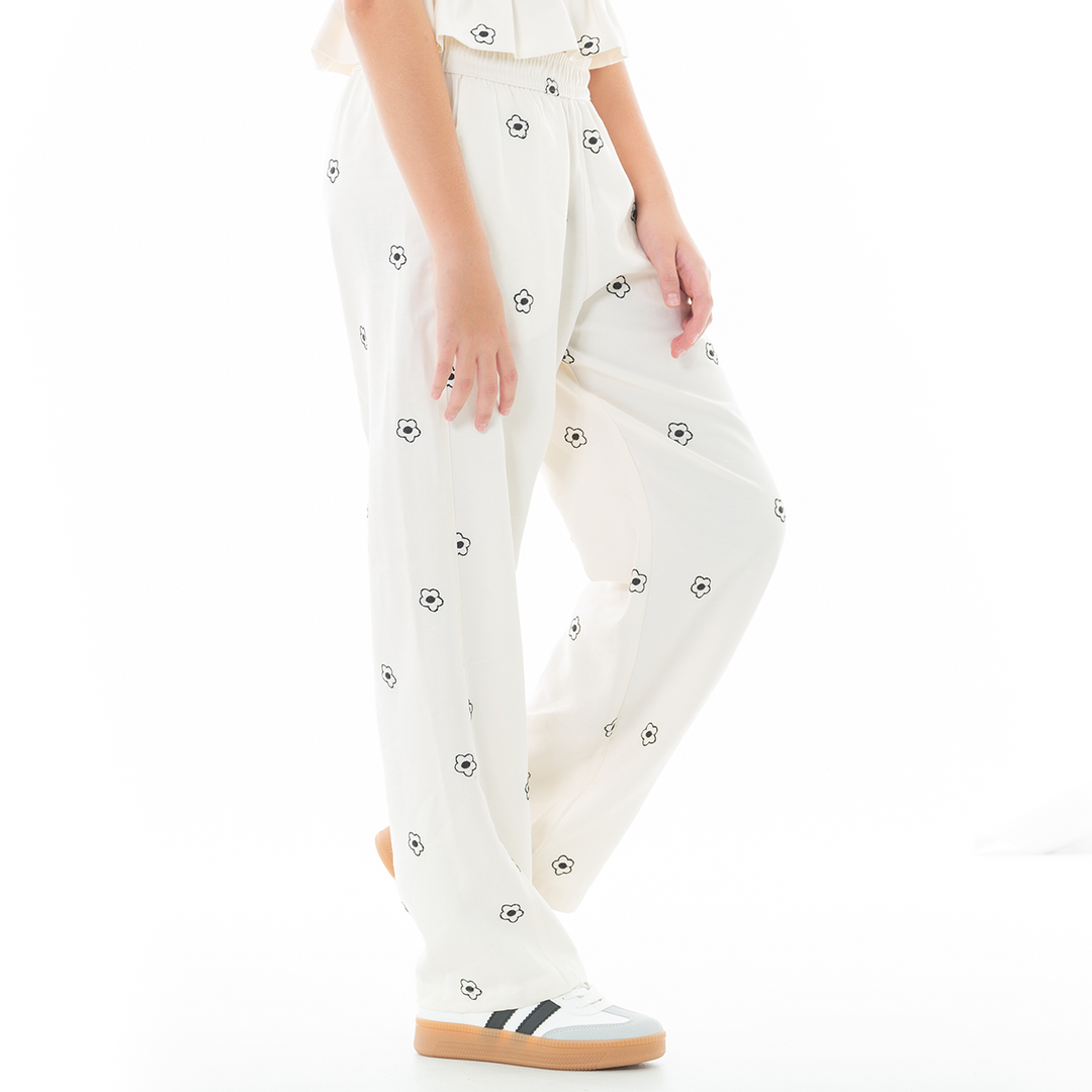 PANTALON PARA NIÑAS CON DISEÑO DE FLORES BORDADAS