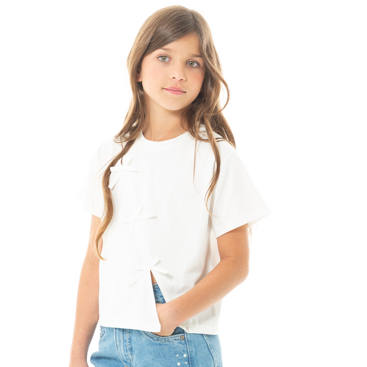 CAMISETA PARA NIÑAS CON APLIQUE DE MOÑOS